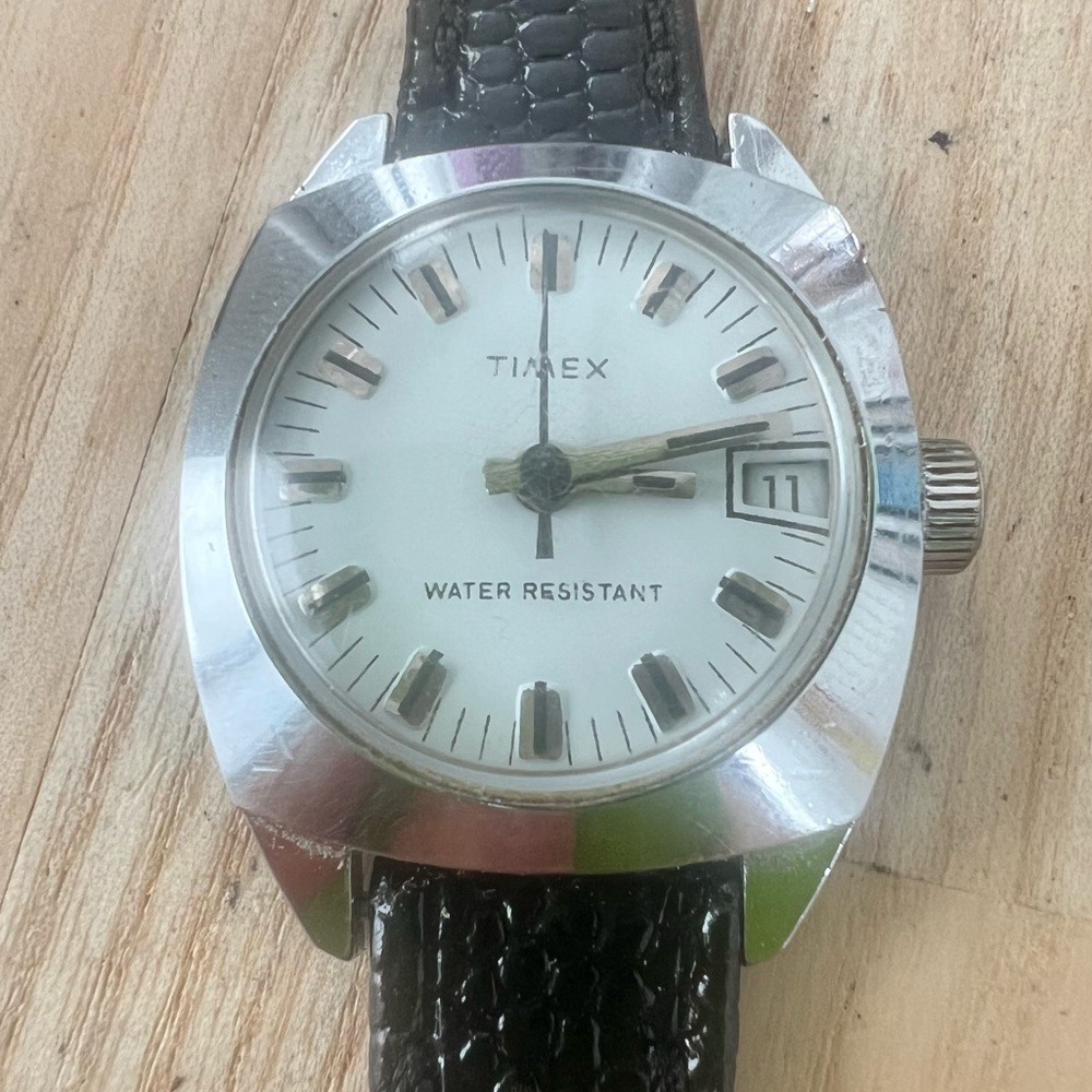 Vintage Timex ladies silver tone black leather mechanical Winding dress watch